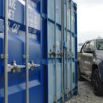 Storage containers for rent in Bristol, on site with car